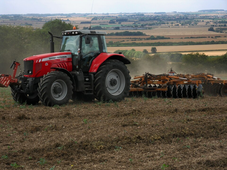 Tractor working a field